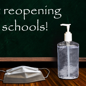Reopening schools on blackboard with mask and hand sanitizer (7/2020)