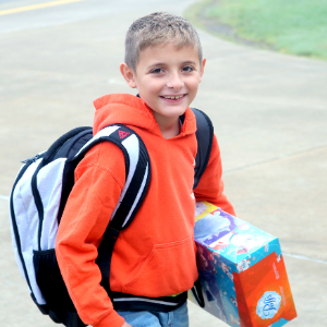 Boy with boxes of tissues (7/31/2020)