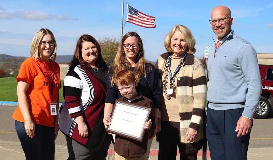 Marshall Sepello with mother and administrators (10/2023)