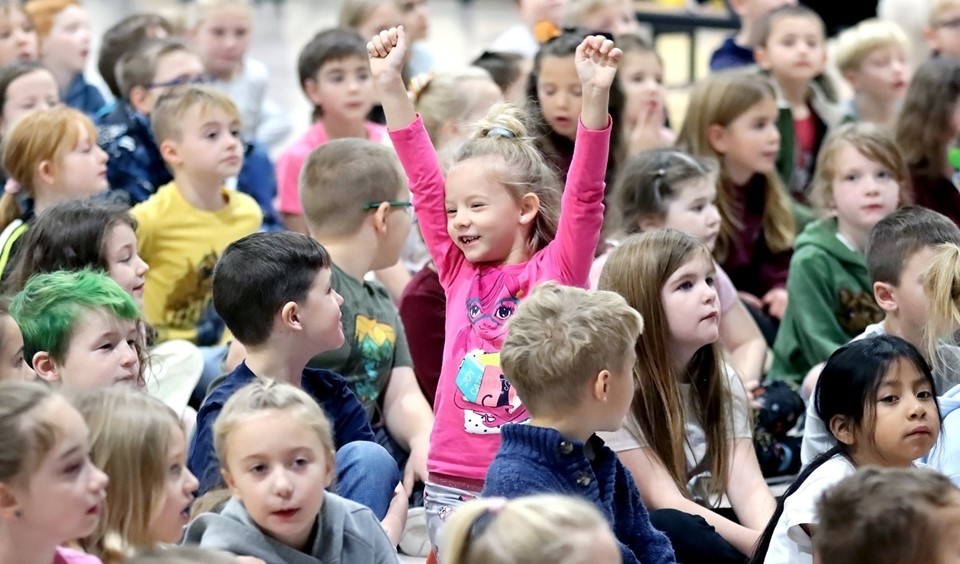 Student cheering at assembly (12/2023)